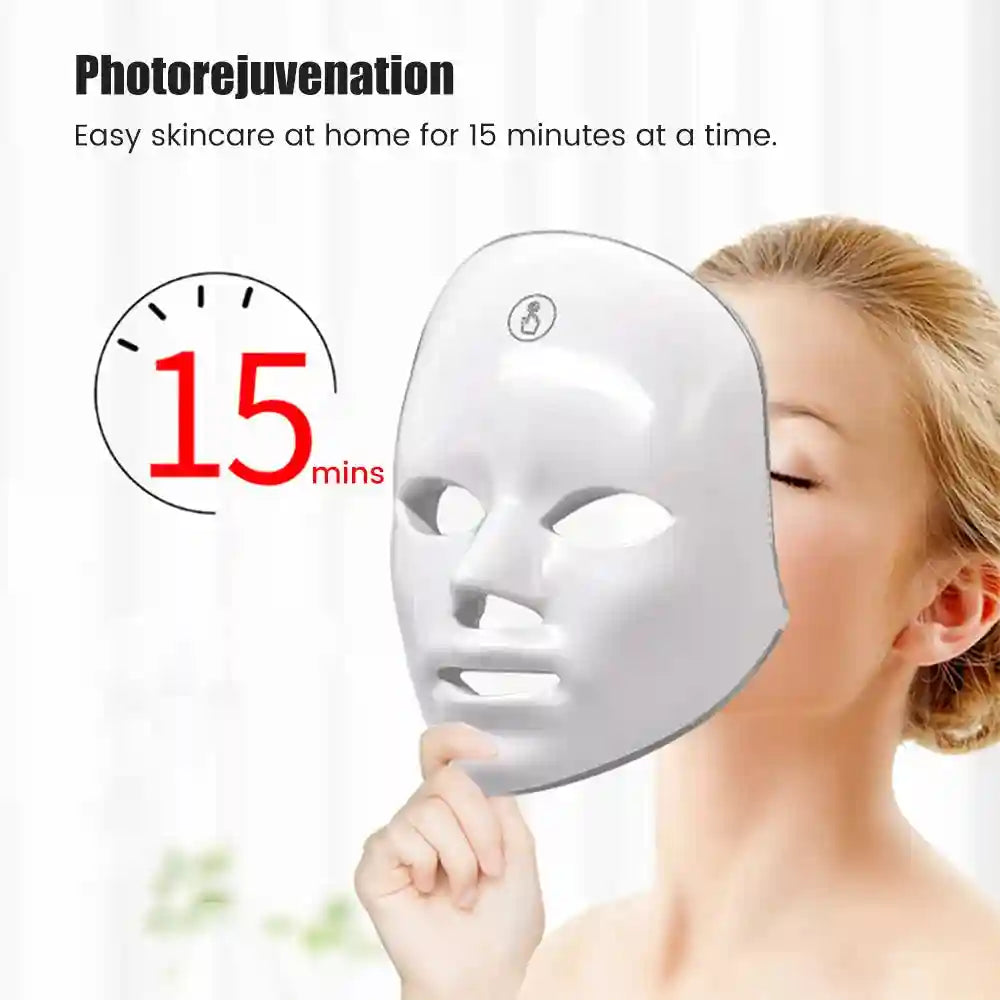 Woman holding a smooth white facial LED mask with cutouts for eyes, nose, and mouth, next to a 15-minute timer graphic.