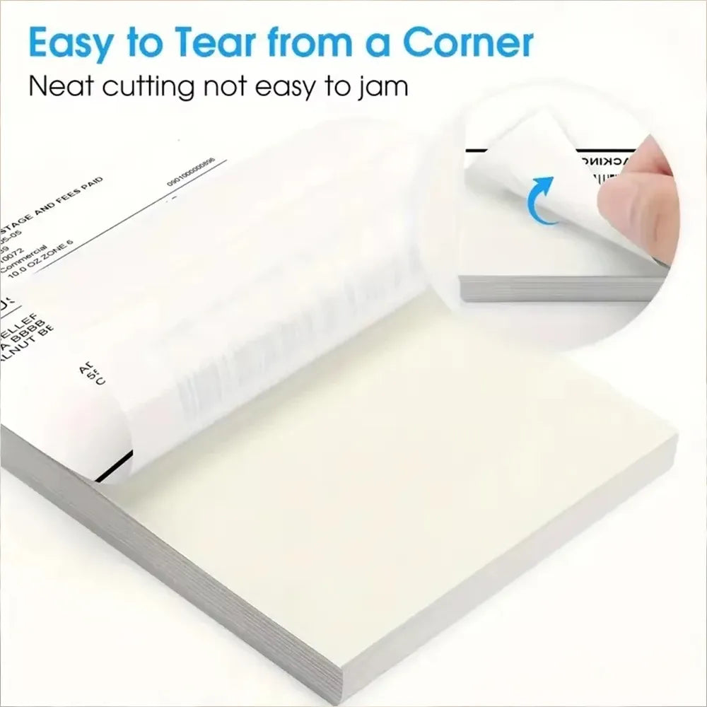 4x6 thermal shipping labels sheet being torn from a stack, adhesive back