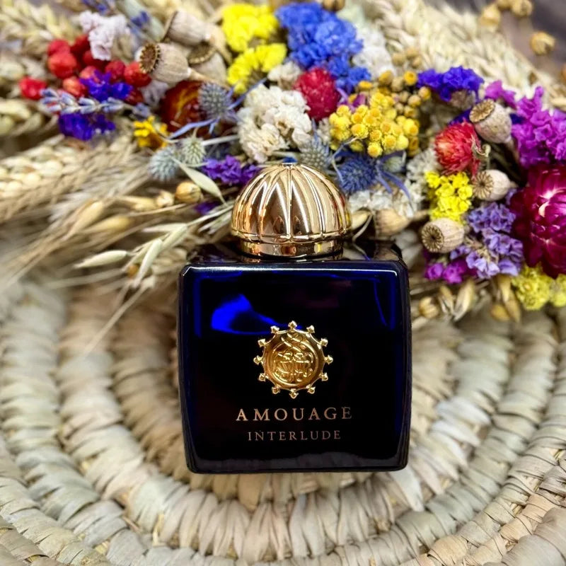 Amouage Interlude Women EDP 100ml: Blue square bottle, floral oriental chypre scent with vanilla, musk, and woody notes.