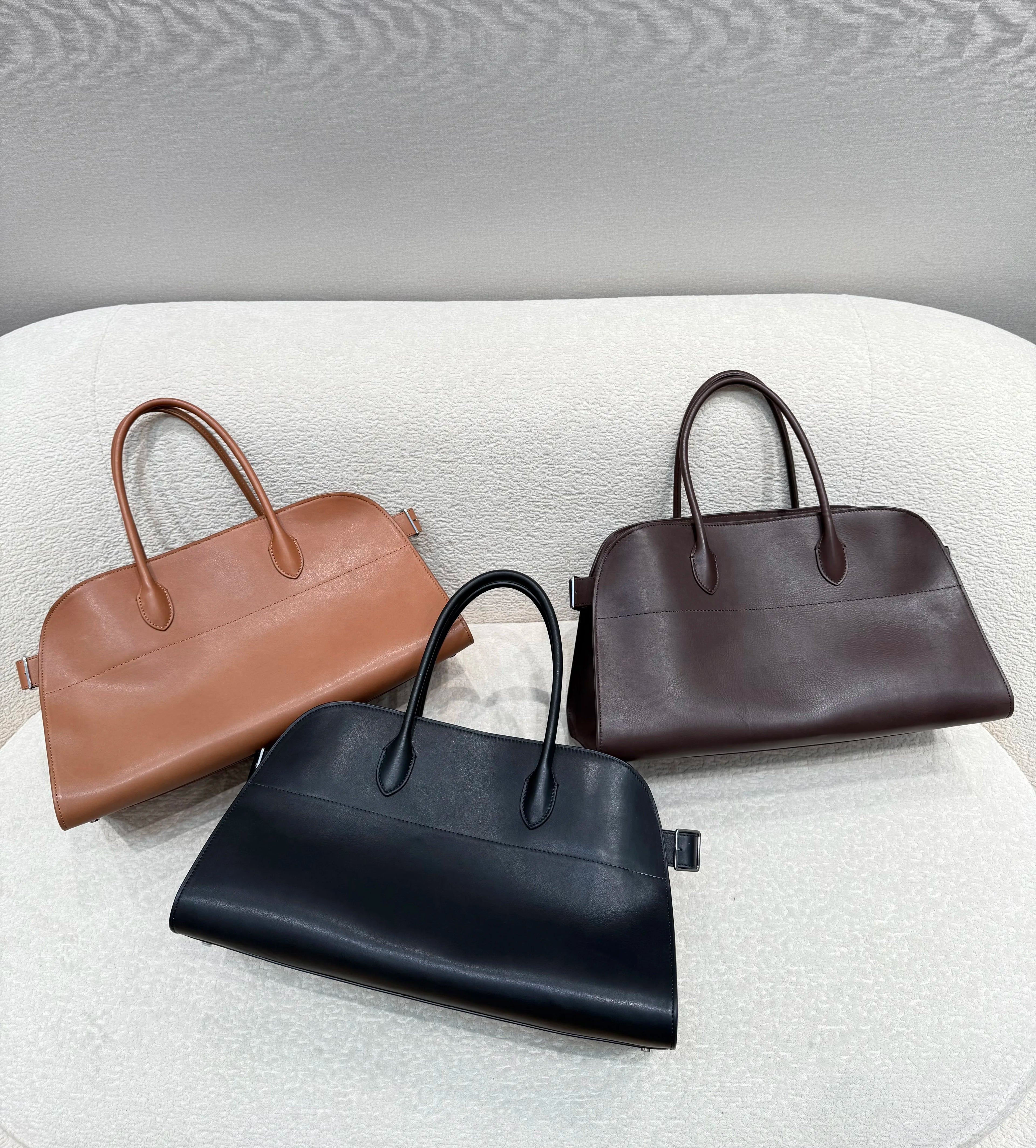 Unisex saddle leather all steel hardware inner sheepskin single shoulder large capacity hand-held horizontal bag