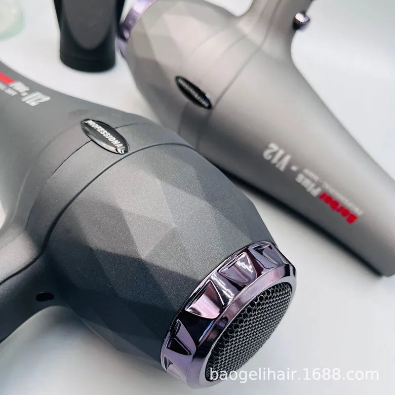 Black and grey 2600W professional negative ion hair dryer with geometric design, salon-quality, and concentrator nozzle.