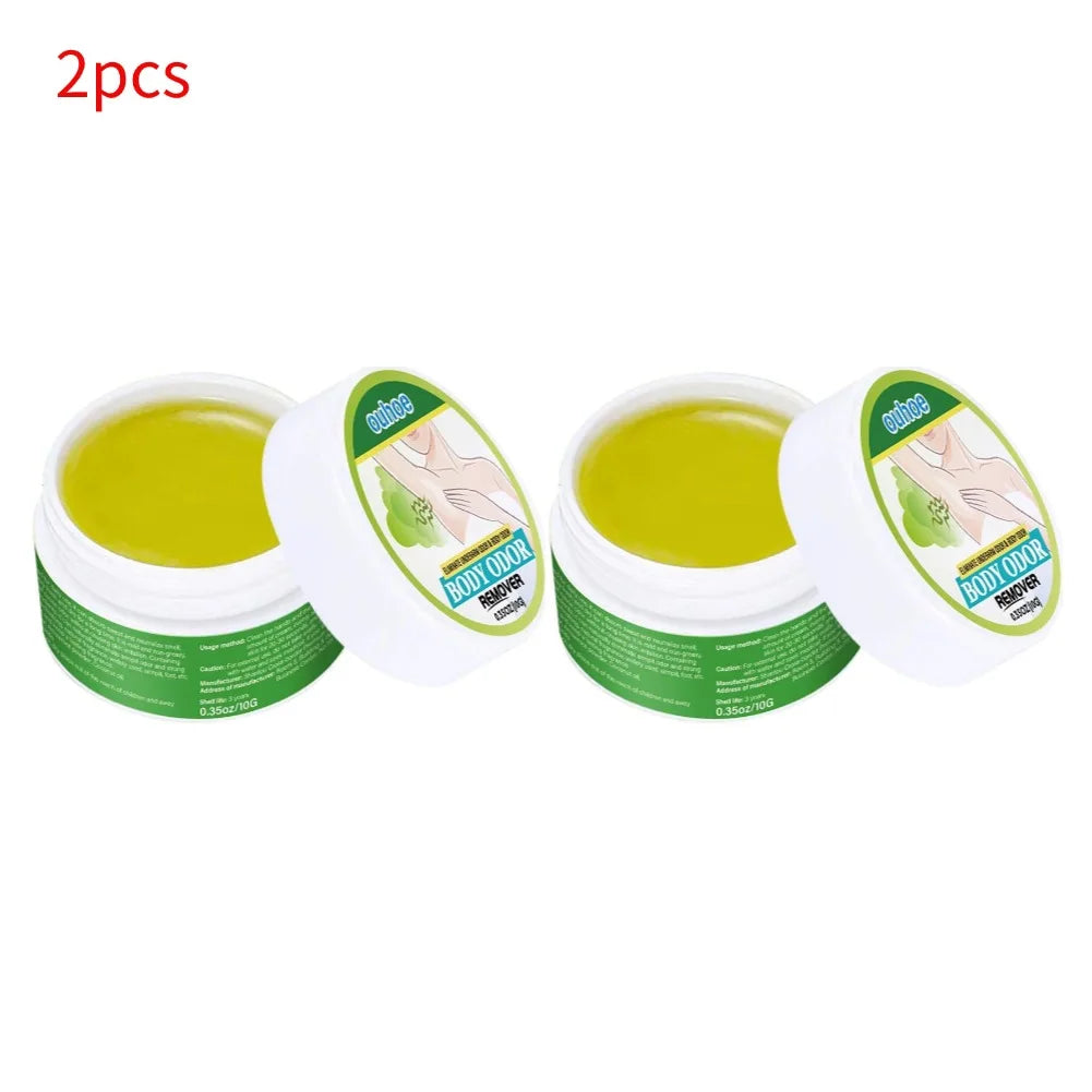 Two jars of natural underarm deodorant cream with a smooth yellow gel texture and white lids on a white background.