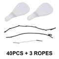 Two clear, teardrop-shaped adhesive face lift patches and three thin elastic tightening cords on a white background.
