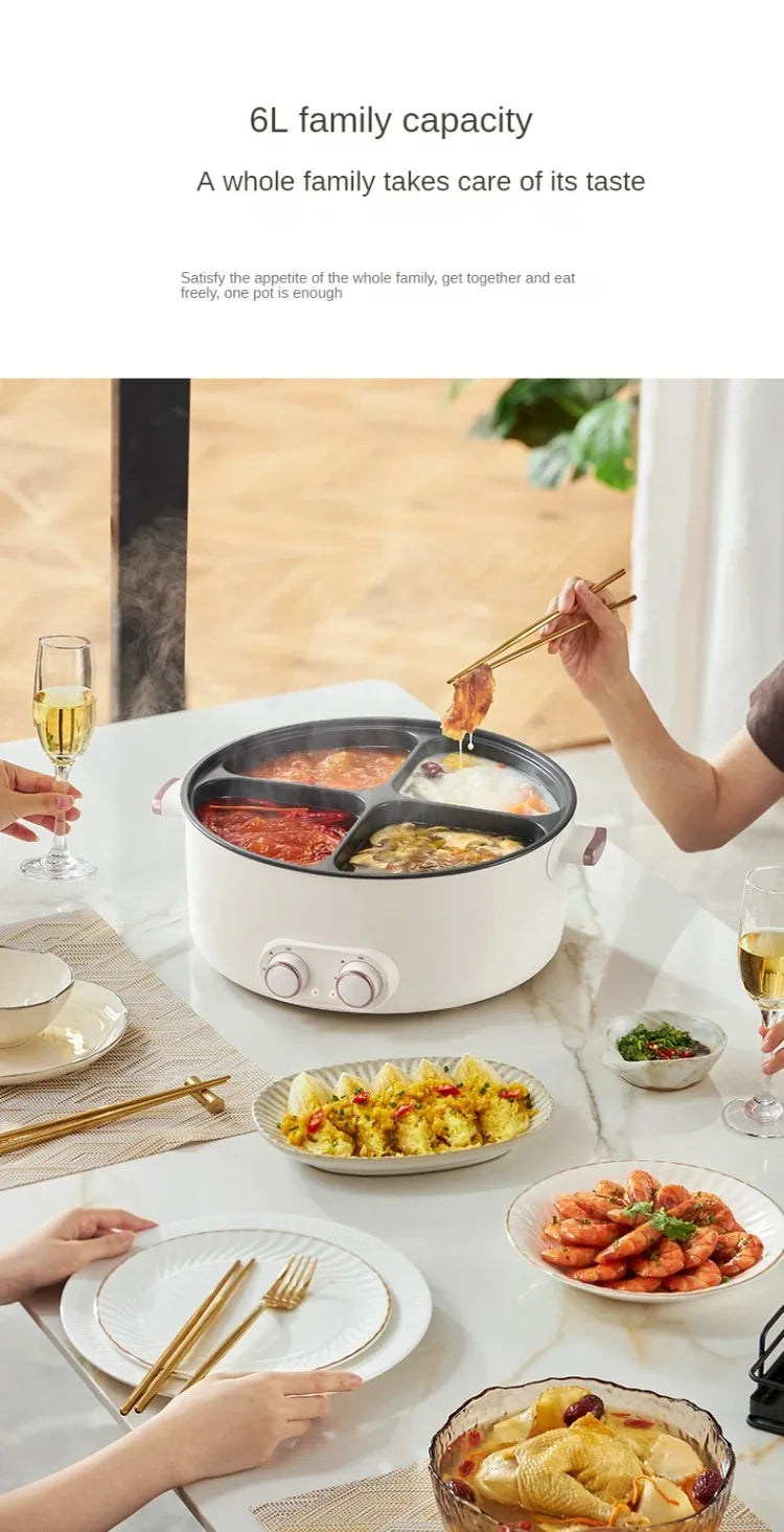 Electric hot pot on dining table with lid open and shared meal portions in compartments