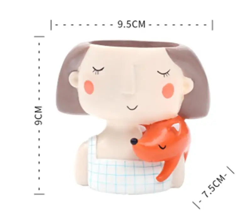 Rabbit-face succulent flowerpot holding orange fish with smiling eyes