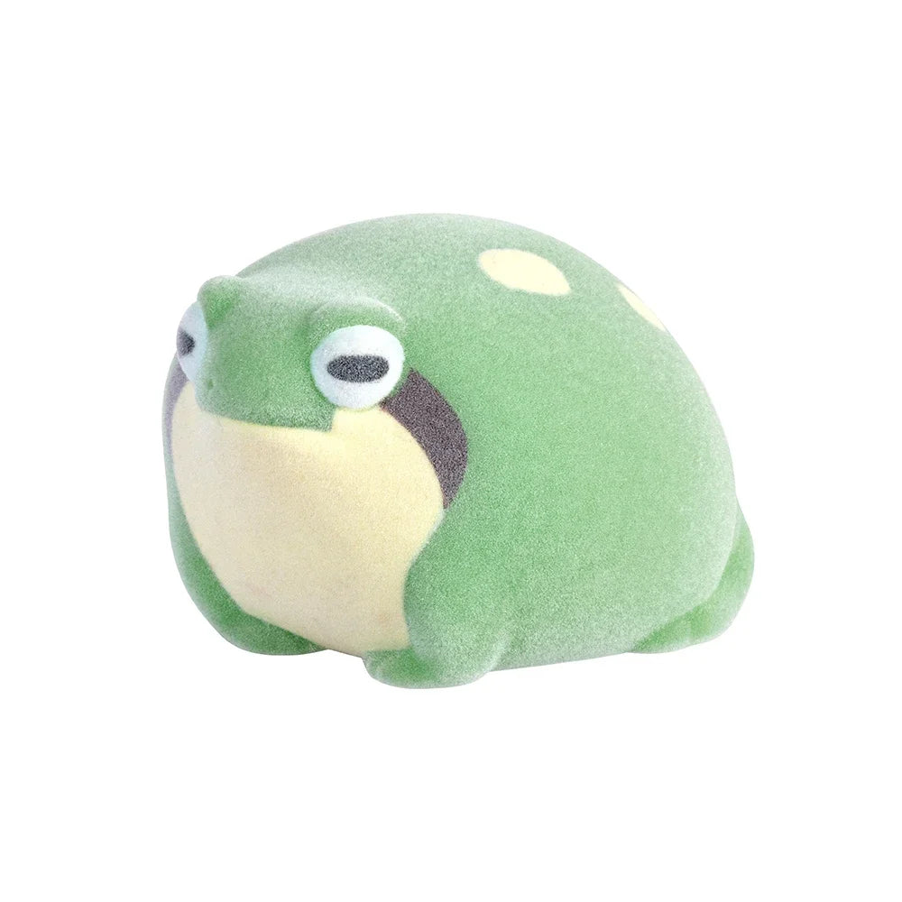 Cute green flocked warabimochigaeru frog toy. Soft, squeezable kawaii pet figure for stress relief or desk decor.