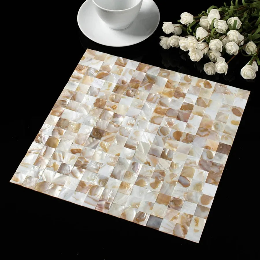 Beige and white mother-of-pearl mosaic tile sticker sheet with iridescent square tiles
