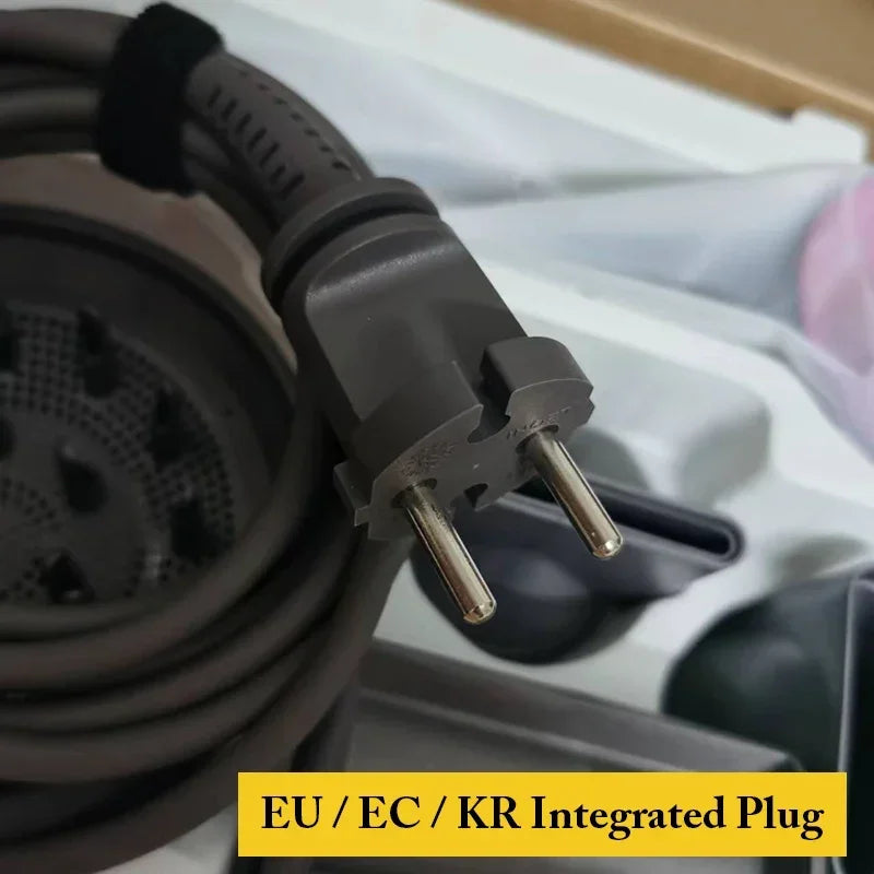 Grey 1600W leafless hair dryer power cord with EU/KR integrated plug and styling attachments in packaging.
