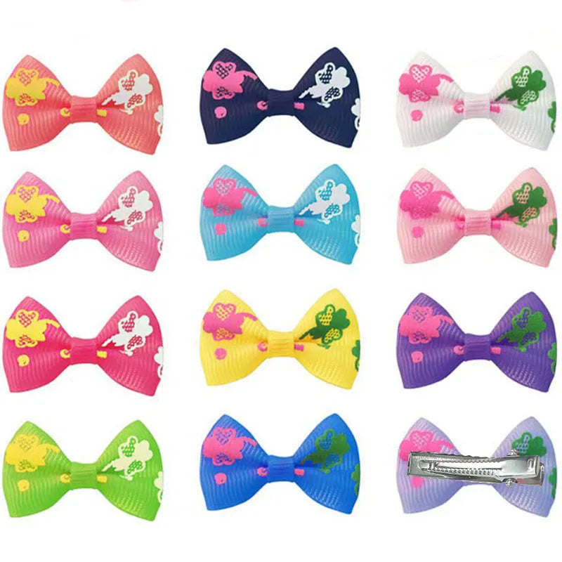 Colorful ribbon bow hair clips for dogs and cats. Cute dotted grooming barrettes for small pet styling.