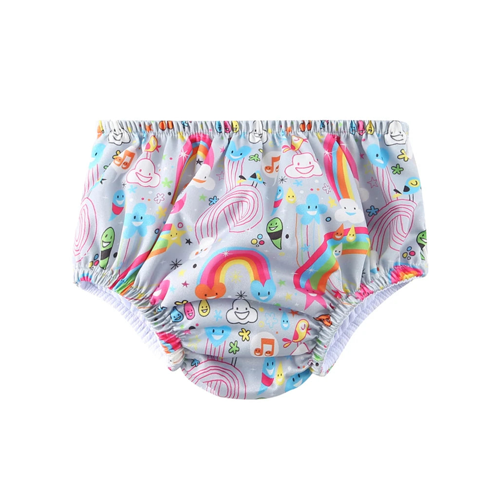 Reusable baby swim diaper with colorful rainbow and cloud pattern for water play.