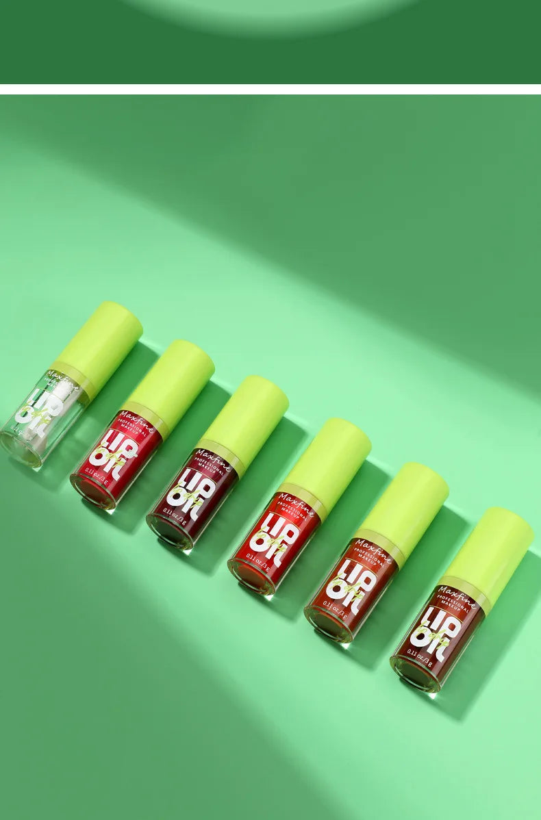 Six Maxfine waterproof lip gloss tubes with lime green caps arranged on a green background. High-shine hydrating formula.