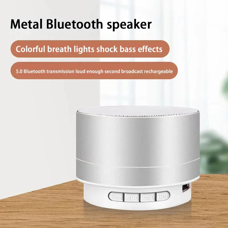 Portable Bluetooth speaker with white metal body and white control base