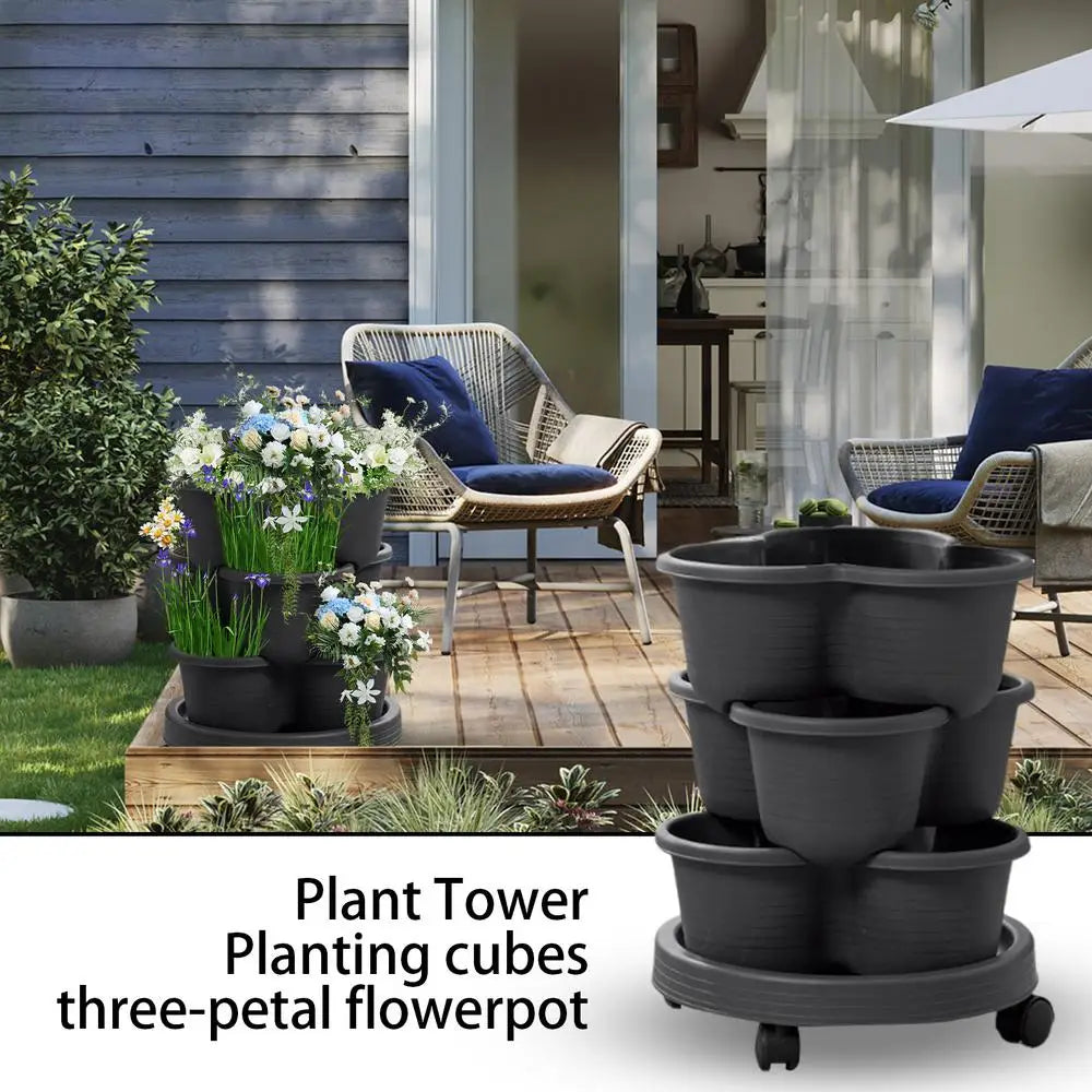Stackable flower pot planter tower with three stacked pots on caster wheels outdoors
