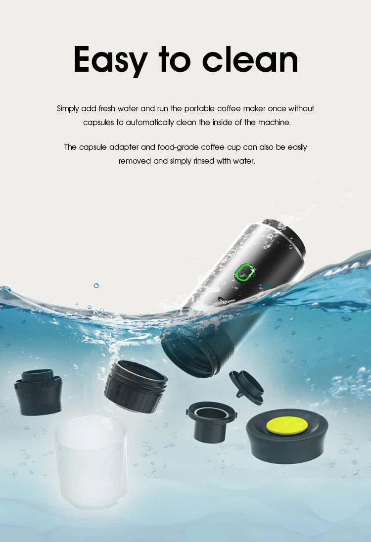 Black portable capsule coffee maker with removable food-grade components for easy cleaning in water.