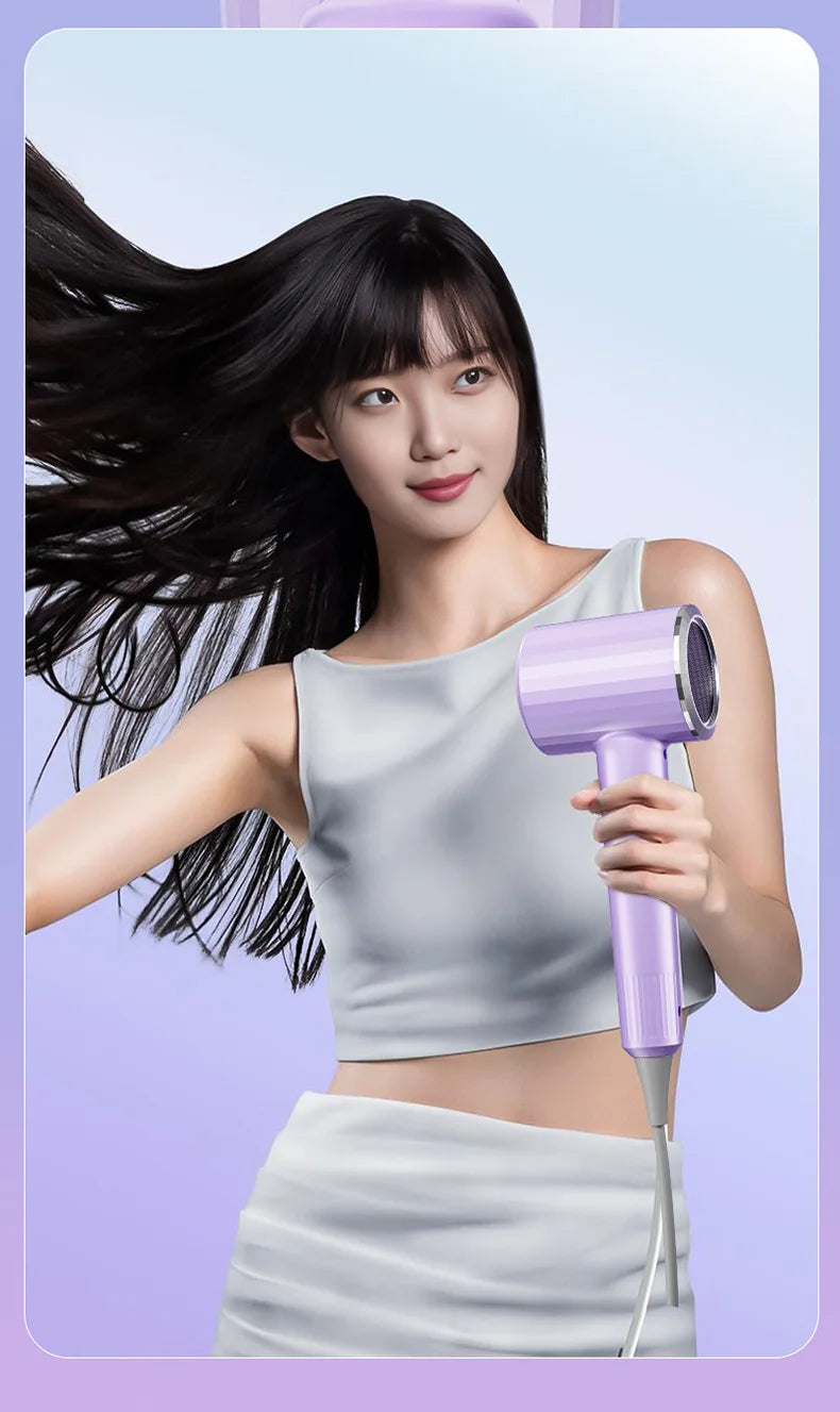 Woman using a purple 2400W ionic hair dryer for fast, salon-quality quick drying at home.