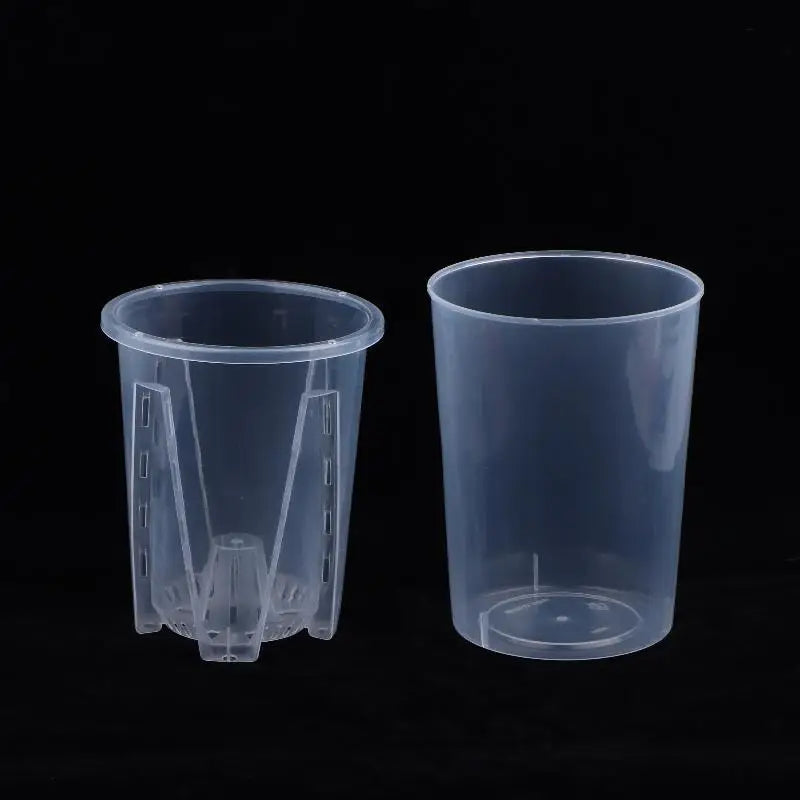 Clear plastic self-watering planter with open rim and inner base reservoir