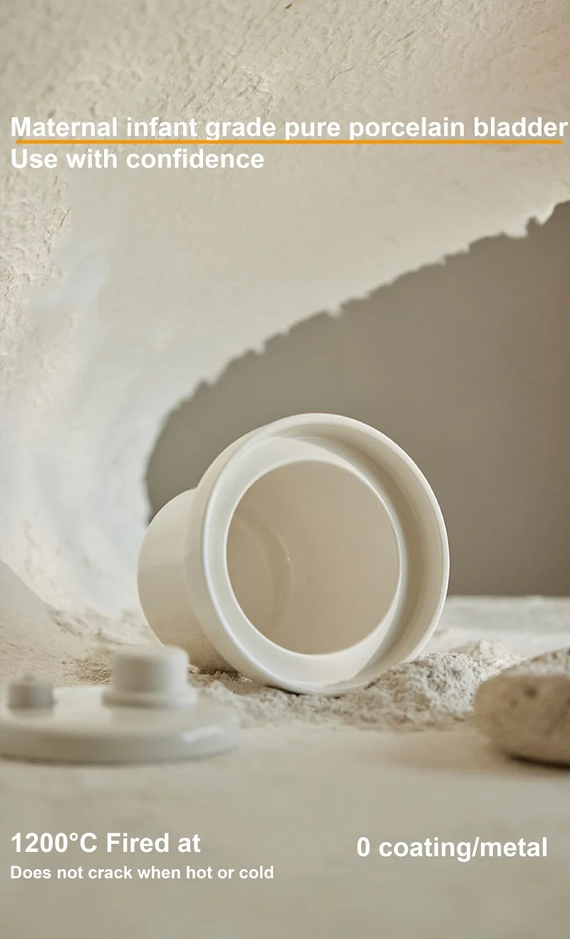 White ceramic inner pot and rim on porous surface for the mini electric cooker