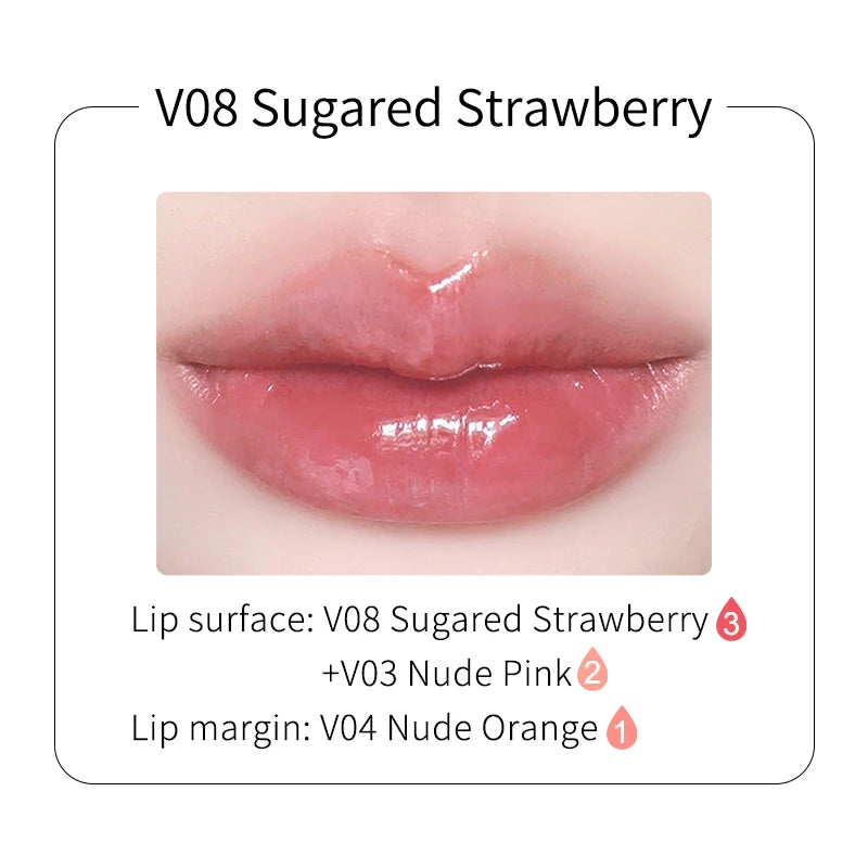 Glossy pink lipstick in shade V08 Sugared Strawberry applied to lips, showing a smooth, shiny finish.