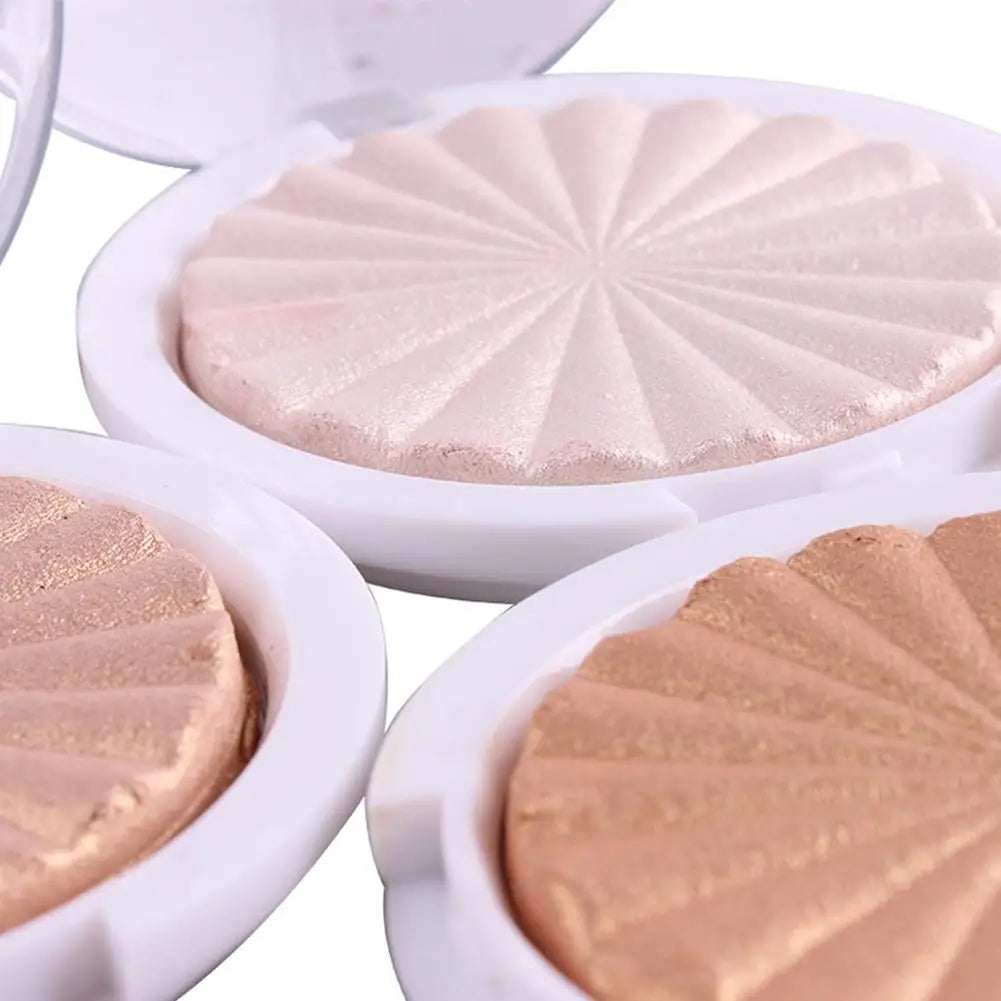 Tidesmit 3D pearlescent shimmer highlighter powder showing texture close-up for radiant face makeup glow