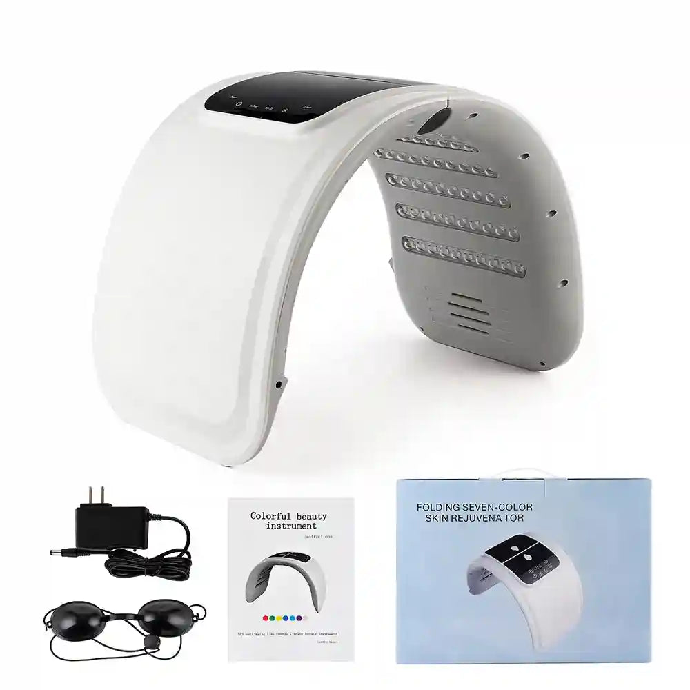 White arched LED light therapy machine with control panel, power adapter, eye protection, manual, and product box.