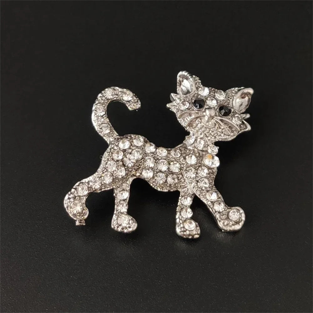 Sparkling silver crystal cat brooch lapel pin. Decorative rhinestone cat jewelry gift for pet lovers.