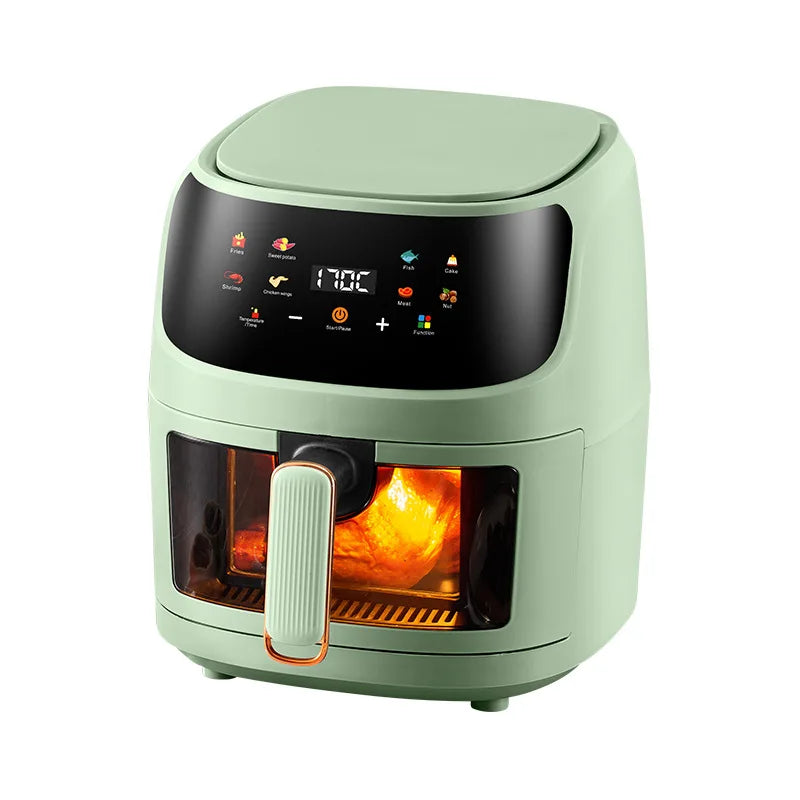 Mint green air fryer with digital touchscreen, handle, and front window showing cooking heat