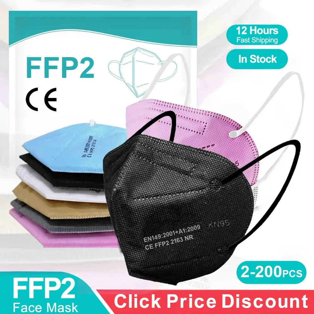 Stack of colorful 5-layer FFP2 KN95 face masks in black, pink, blue, and tan with textured protective fabric.