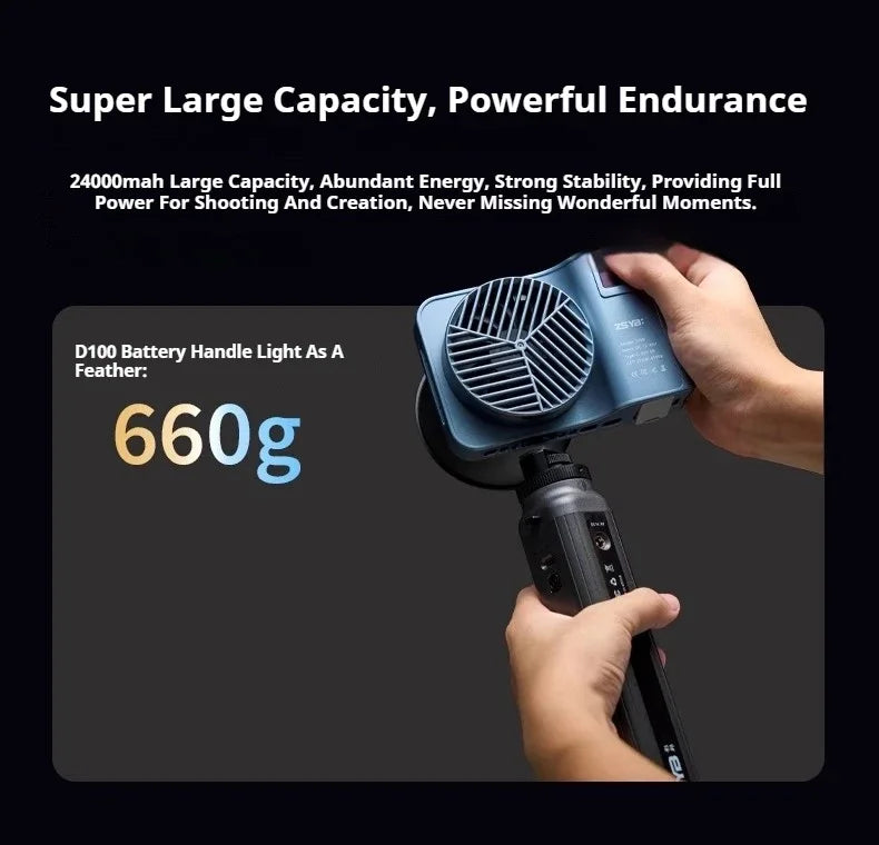 Blue 24000mAh battery handle with integrated cooling fan, held in hand for portable photography and lighting power.