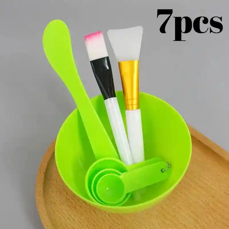 7-piece facial mask mixing set includes a green bowl, spatula, measuring spoons, and two applicator brushes.
