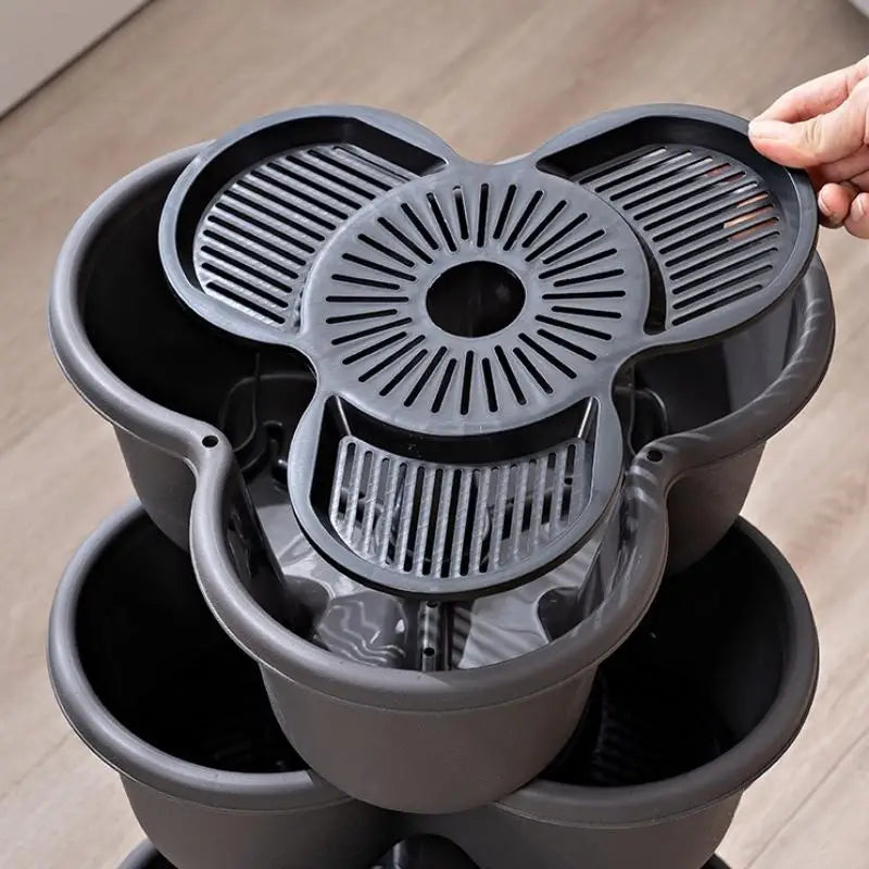 Stackable planter tower insert with slotted vents and central hole
