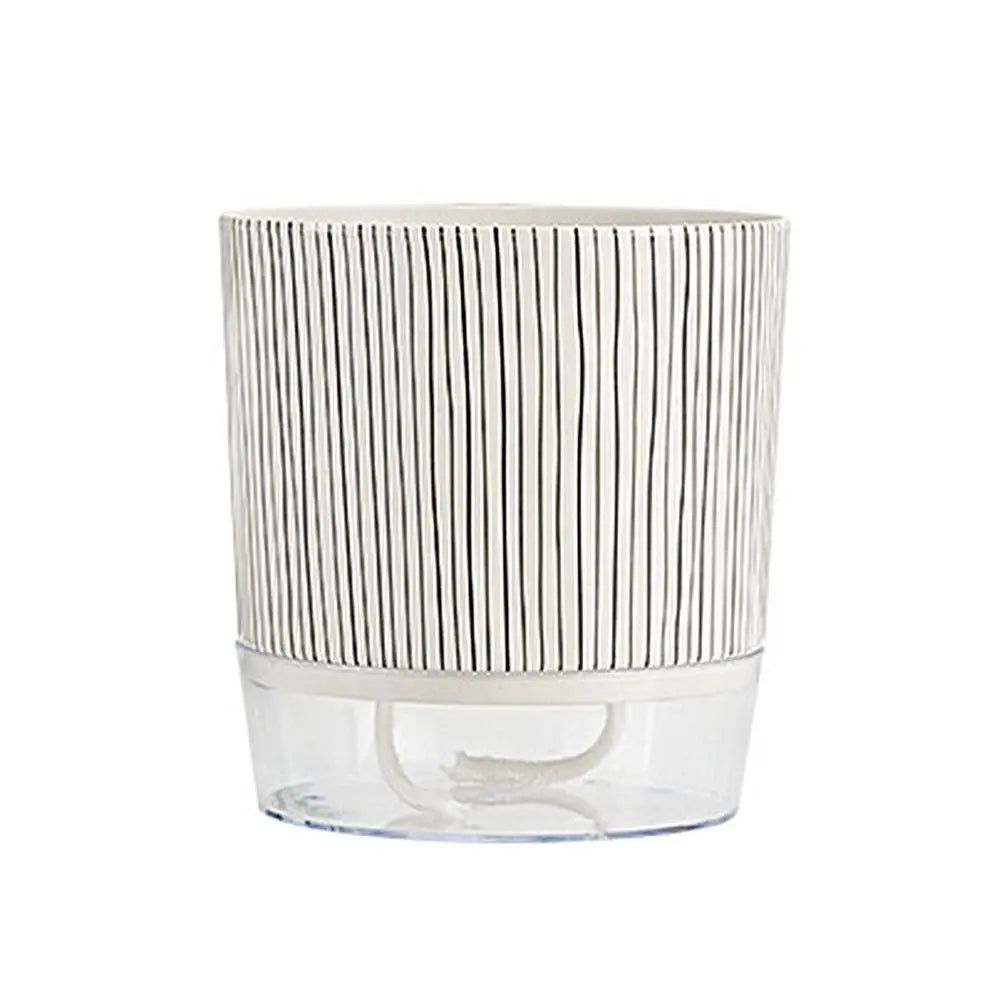 Self-watering planter pot with vertical black stripe sleeve above clear water container