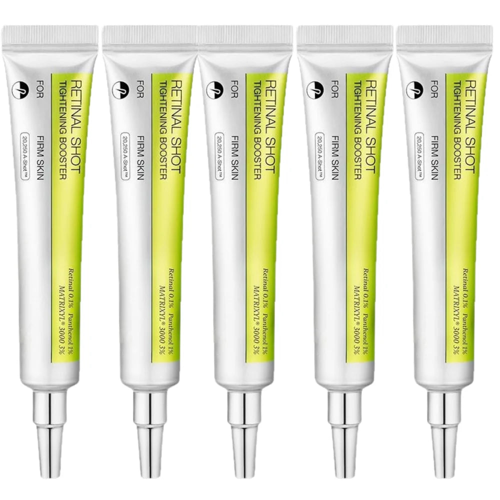 Close-up of several white and lime green serum squeeze tubes