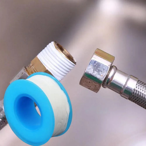 Blue pipe sealing tape roll and faucet fitting with white tape strip