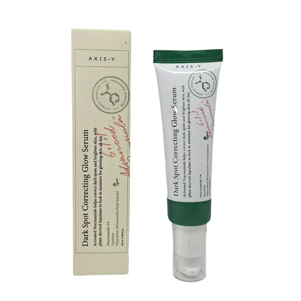 Korean AXIS-Y dark spot correcting glow serum, beige box and green-capped tube