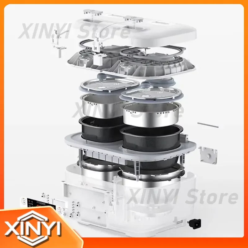 White mini smart rice cooker with exposed internal parts and stacked cooking modules