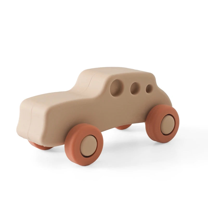 Beige and terracotta silicone car teething toy for baby teething relief.