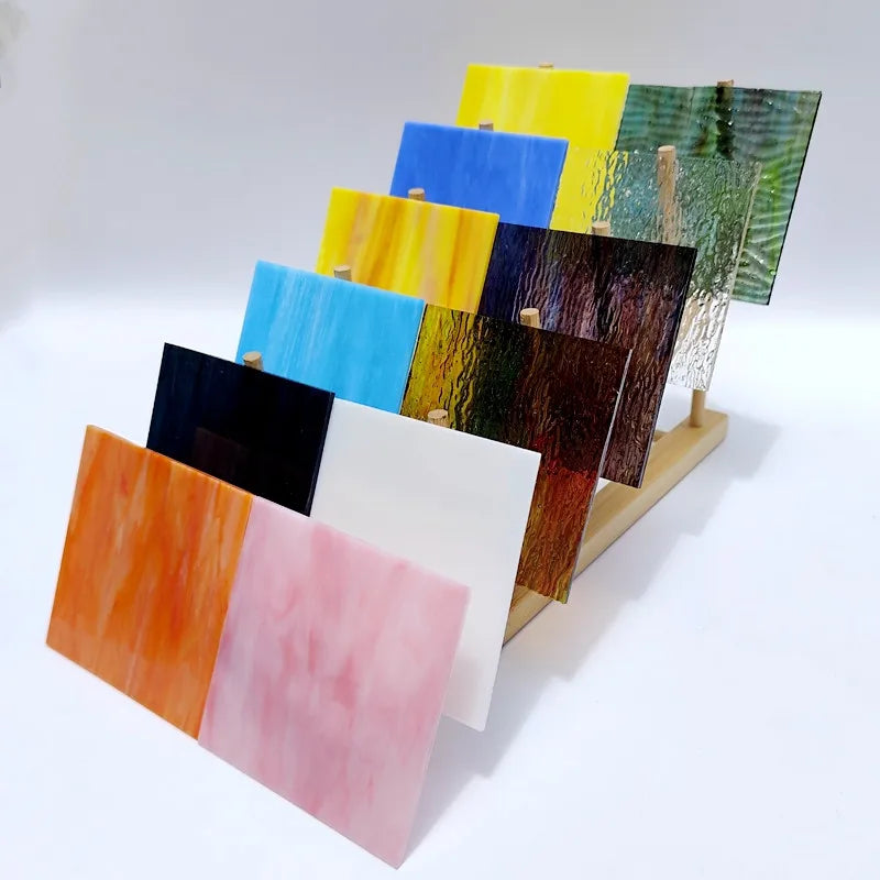 Assorted textured translucent stained glass square tiles, orange, pink, yellow, blue, green, black