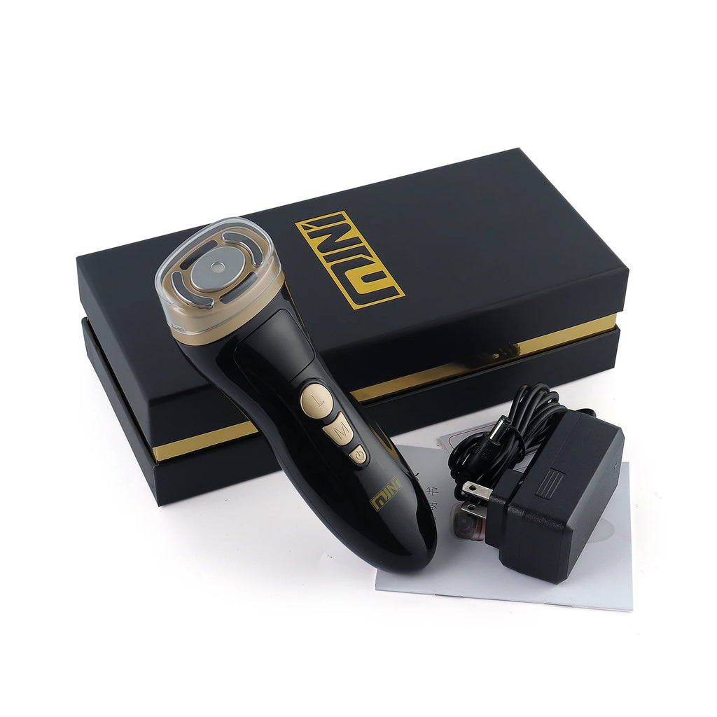 Black and gold handheld HIFU facial device with charging adapter, manual, and black branded storage box.