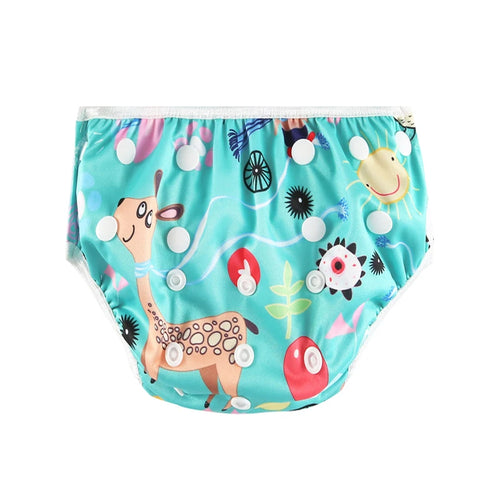 Reusable cloth diaper in teal with giraffe print, adjustable snap buttons, and sun design for baby care.