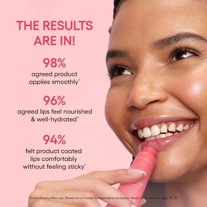 Laneige strawberry lip gloss results: model applying glossy, hydrating, non-sticky pink lip balm for smooth results.