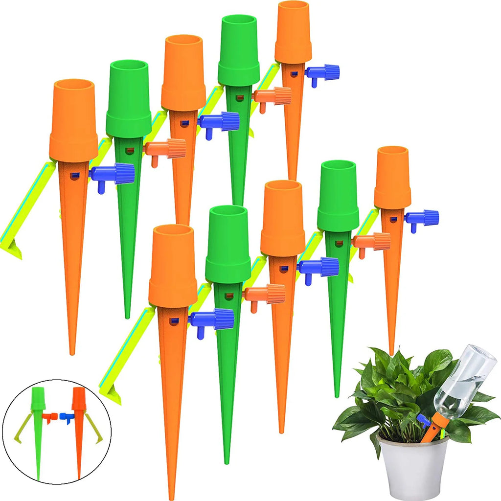 Auto drip irrigation bottle spike set with green and orange drippers for garden plants