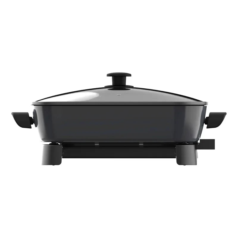 Electric nonstick frying pan with glass lid, top knob, and side support feet
