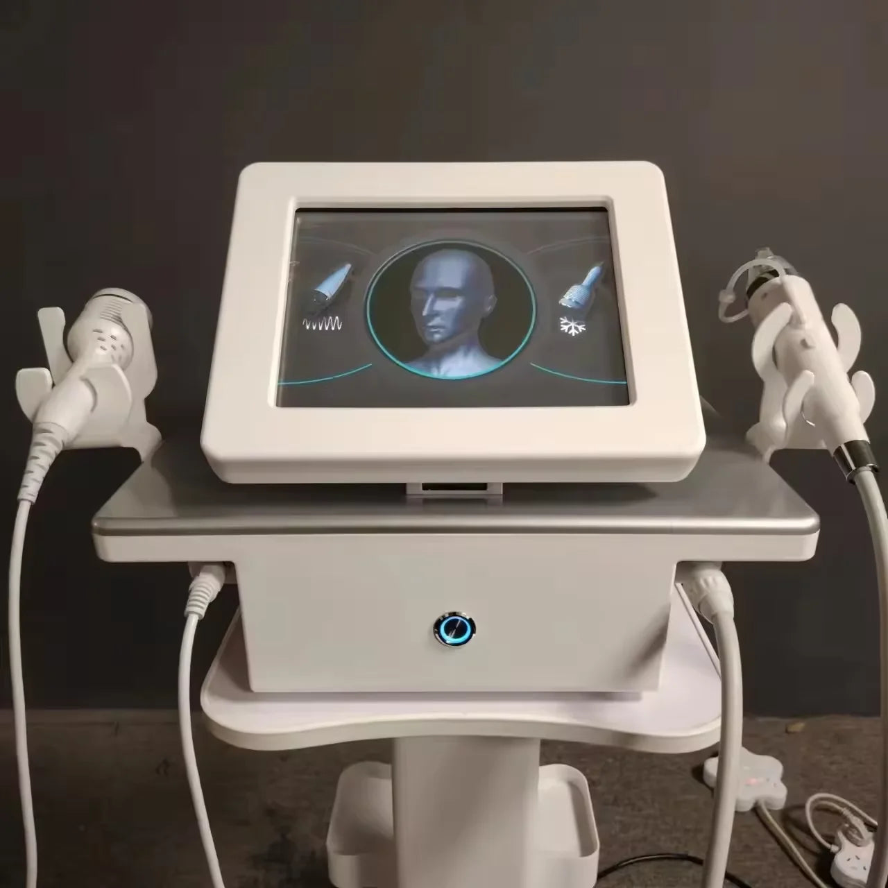 White portable fractional RF skin tightening machine with touchscreen interface and two treatment handpieces.