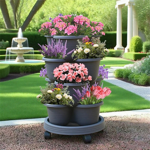 Stackable vertical garden planter with wheels, dark gray base and multiple pots with flowers.