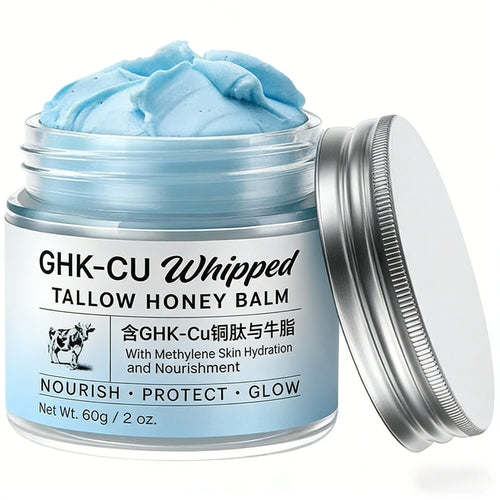 Whipped tallow honey balm jar with silver lid open, showing light blue whipped cream