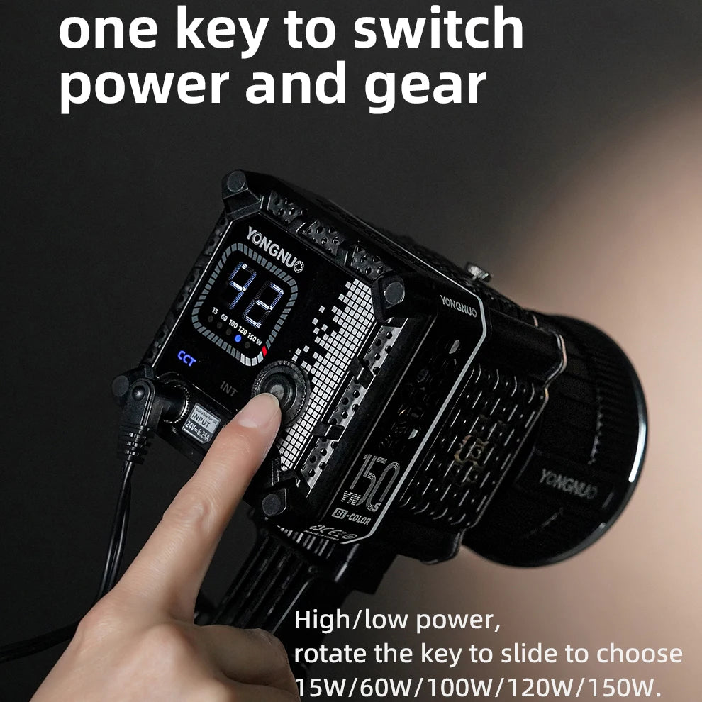 Black YN150 LED video light with a digital display, operated by a push-and-rotate dial for adjusting power and output.