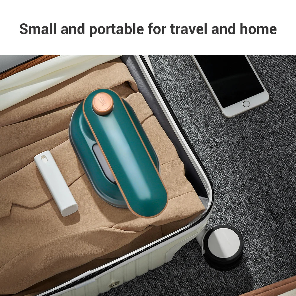 Tidesmit portable handheld garment steamer showing rotating head feature for efficient travel clothes ironing
