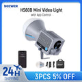 Gray HS60B mini video light with white dome diffuser, power adapter, and carrying case for professional lighting.