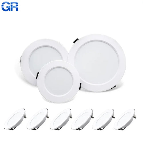 Set of three round recessed LED downlights with white trim and frosted lens