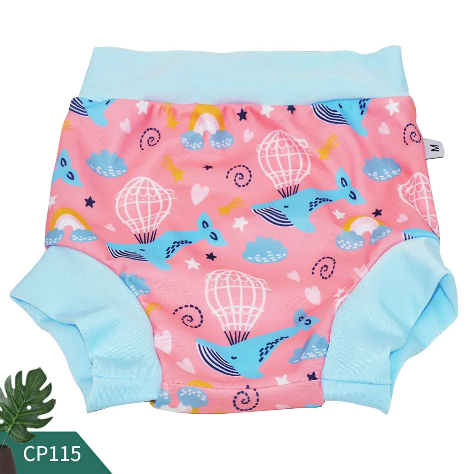 Size M baby swim diaper with pink whale, rainbow, and hot air balloon print for infant water care.